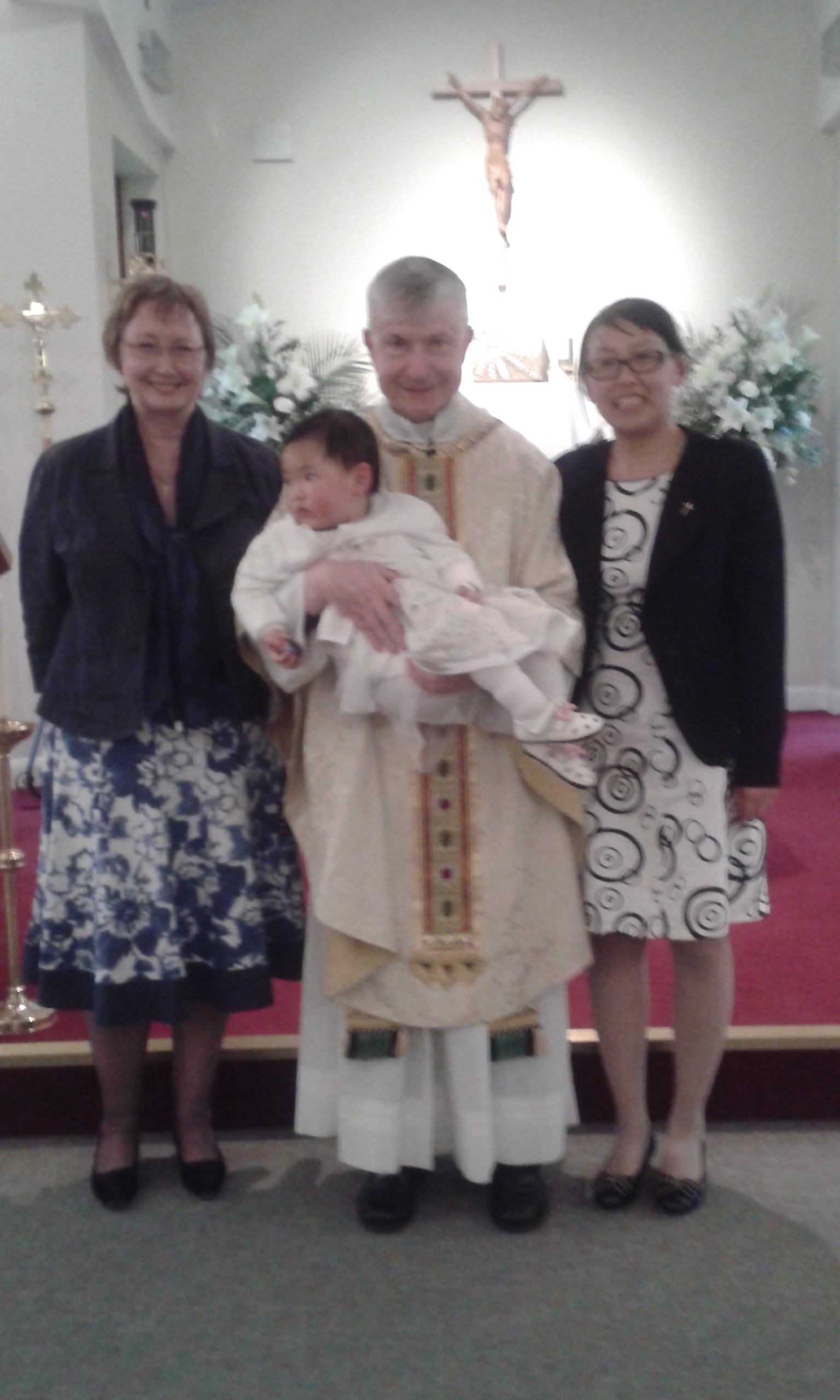 Anne Trotter, Fr Sean with Jay-cee, and Jing Li